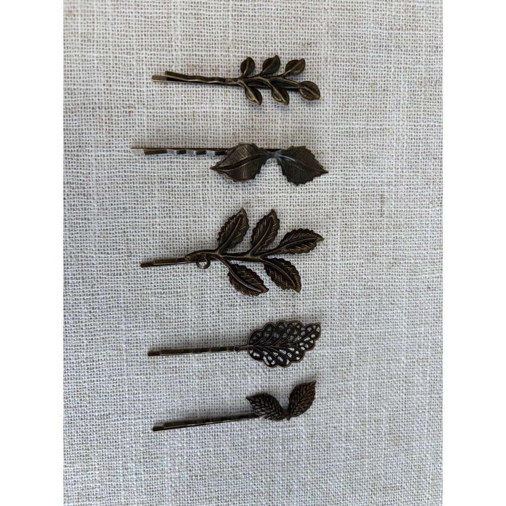 Vintage bronze leaf and feather hair pins - witchy botanical
